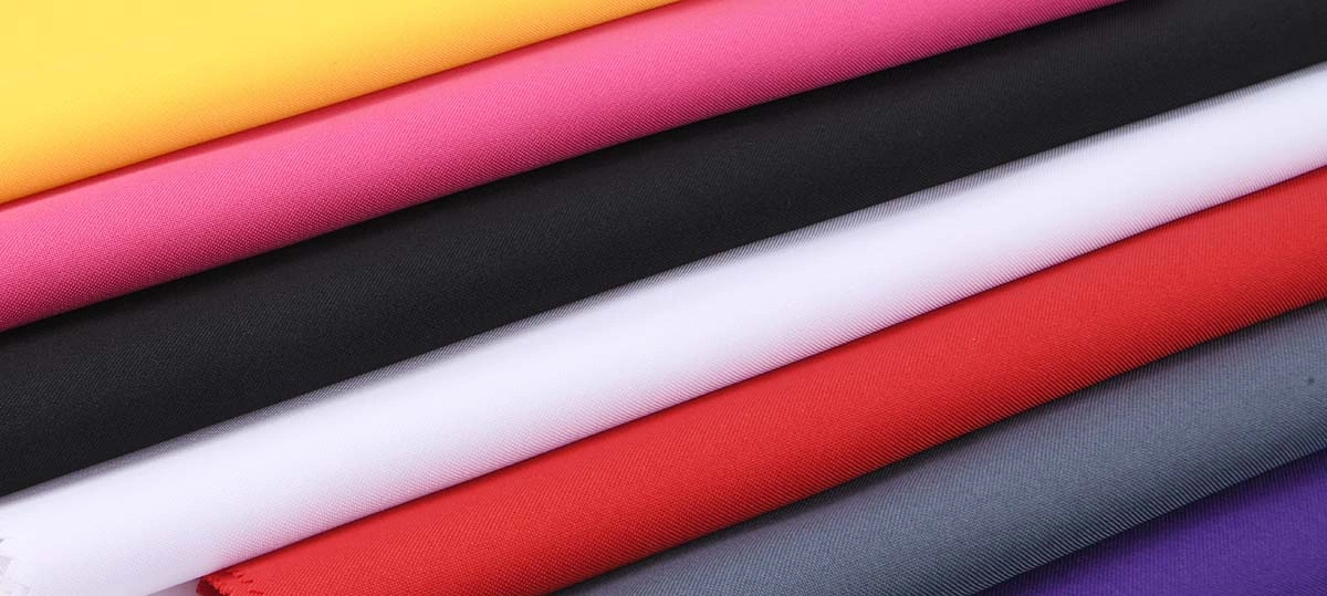 Kain mini matt tenun polos 100% poliester untuk pengadaan seragam B2B.