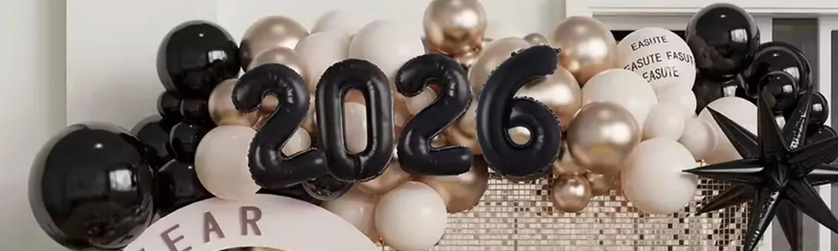 New Year balloons and banners in red and gold