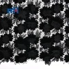 Tissu brodé découpé au laser festonné