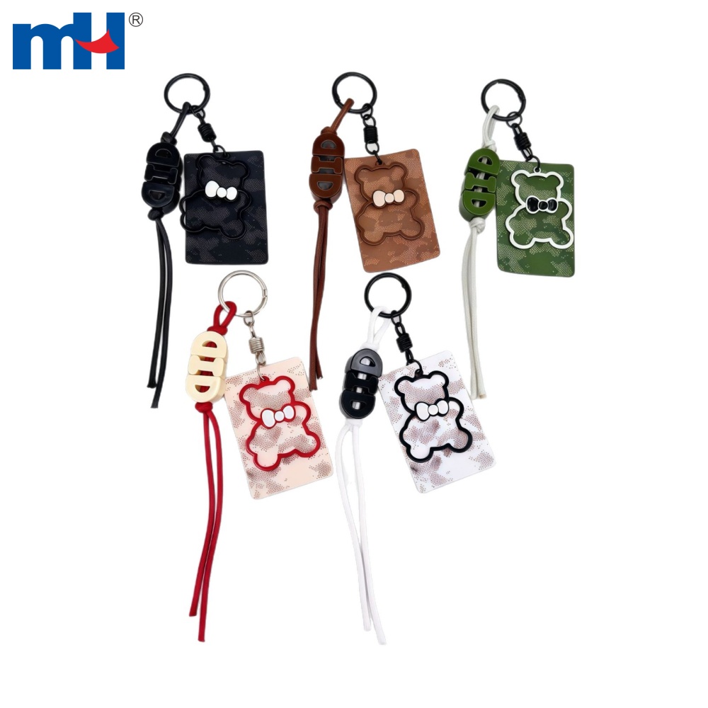 Five bear letter charms laid out flat