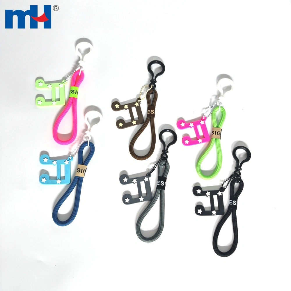 Breloques en PVC en forme de notes de musique, disponibles en six coloris.