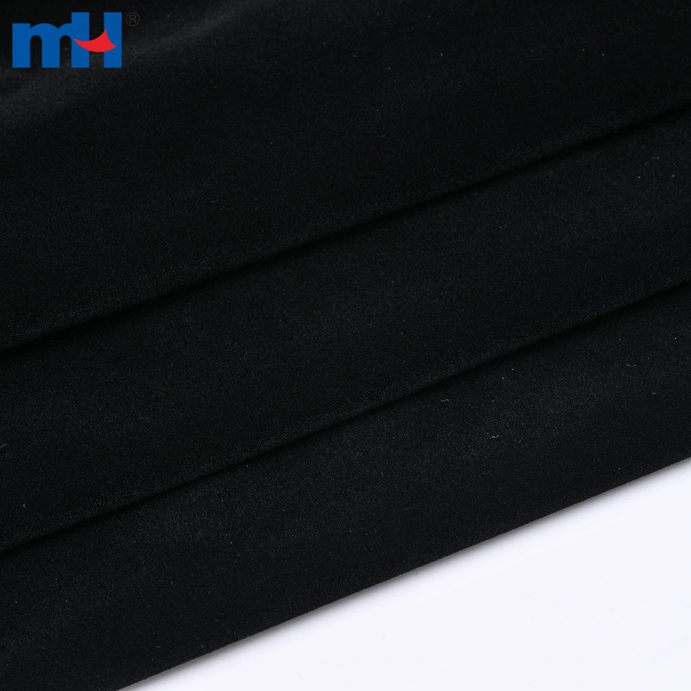 Gros plan de la surface d'un tissu tricoté chaîne floqué en nylon