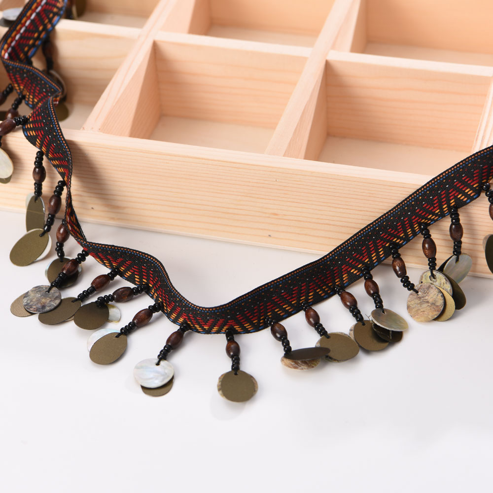 ethnic style copper coin bead tassel fringe trim close view