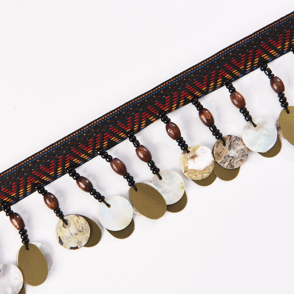 copper coin bead tassel fringe trim displayed on card