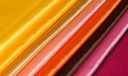 Which Types of Wholesale Satin Material Are Best for Different Garment Applications?