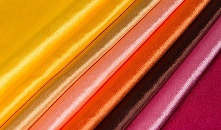 Which Types of Wholesale Satin Material Are Best for Different Garment Applications?