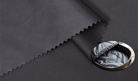 How Does Coated Taffeta for Bag Lining Perform in Outdoor and Industrial Environments?
