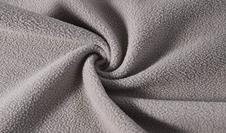 How to Choose the Right Wholesale Fleece Material Supplier for Large-Scale Garment Production?