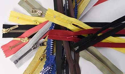 How Do Manufacturers Source Zippers in Bulk for Large-Scale Production?