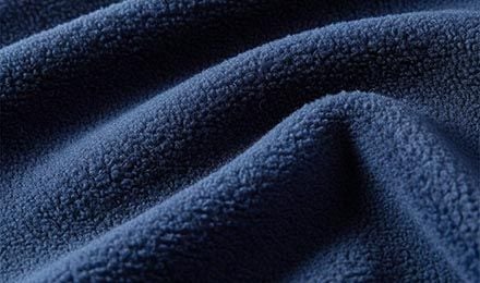 Why Is Polyester Fleece Widely Used in Apparel Manufacturing?